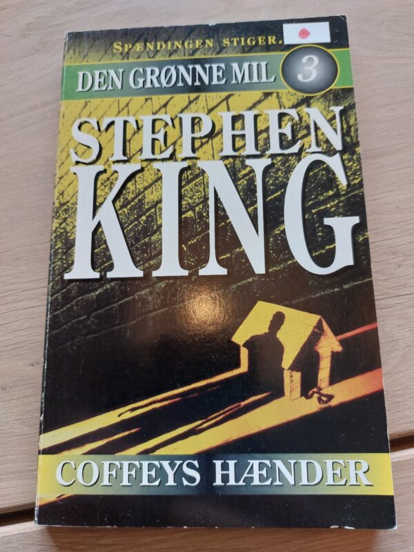 Forside af bogen Den Grønne Mil 3: Coffeys hænder af Stephen King. Mørkegrønt cover med en silhuet.
