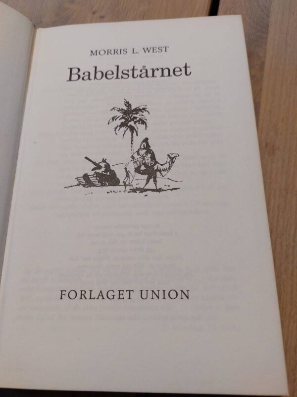 Titelblad af 'Babelstårnet' med kamel illustration