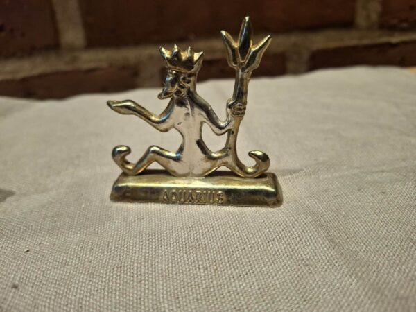 Messingfigur af vandmand med trident