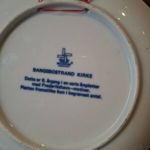 Bagsiden af årsplatte 1984 med tekst om Frederikshavn