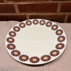 Flad Thun tallerken med brun-gule blomster langs kanten