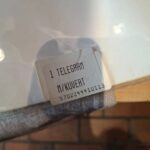 Bagside af telegram med original kuvert