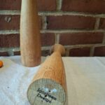 Bunden af lysestage med Jacobsen Design logo