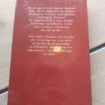 Bagsiden af bogen De tolv apostle med en synopsis om de ledende advokater og Christina Giles.