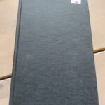 Forside af bogen Havets Katedral af Ildefonso Falcones. Mørkegrøn hardback med diskret tekstur.