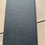 Bagsiden af bogen Havets Katedral af Ildefonso Falcones. Mørkegrøn hardback uden billeder eller tekst.