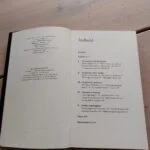 Opslag i bogen Berlusconi med indholdsfortegnelse over kapitlerne og afsnittene i biografien.