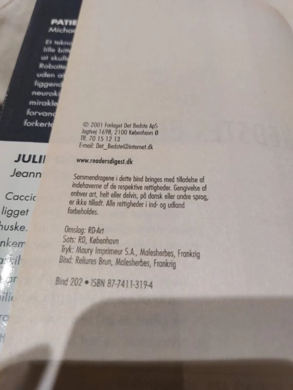Et nærbillede af copyright- og udgiverinformationen i bogen 'Det Bedstes Bøger – Bind 202'.