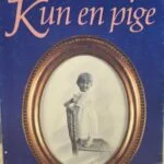 Forsiden af bogen 'Lidenskabens Veje' af Barbara Cartland, med en illustreret mand og kvinde i traditionel tøj.