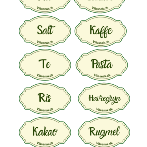 Nærbillede af 10 ovale, cremefarvede køkkenklistermærker med grøn kant til krukker, med teksten 'Mel', 'Sukker', 'Salt', 'Kaffe', 'Te', 'Pasta', 'Ris', 'Havregryn', 'Kakao' og 'Rugmel' på dansk.