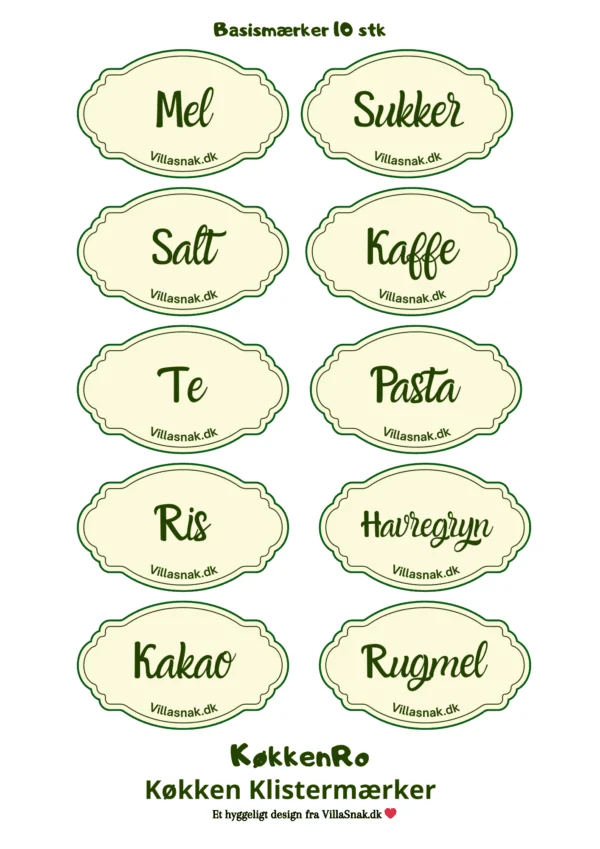 Nærbillede af 10 ovale, cremefarvede køkkenklistermærker med grøn kant til krukker, med teksten 'Mel', 'Sukker', 'Salt', 'Kaffe', 'Te', 'Pasta', 'Ris', 'Havregryn', 'Kakao' og 'Rugmel' på dansk.