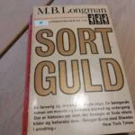 Forsiden af Sort Guld lommeroman med guldtekst