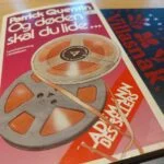 Forside af bogen med farverigt filmrulledesign