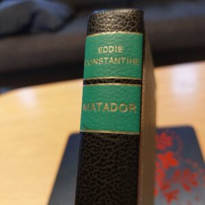 Eddie Constantine Matador bogryg med sort læder og grøn label
