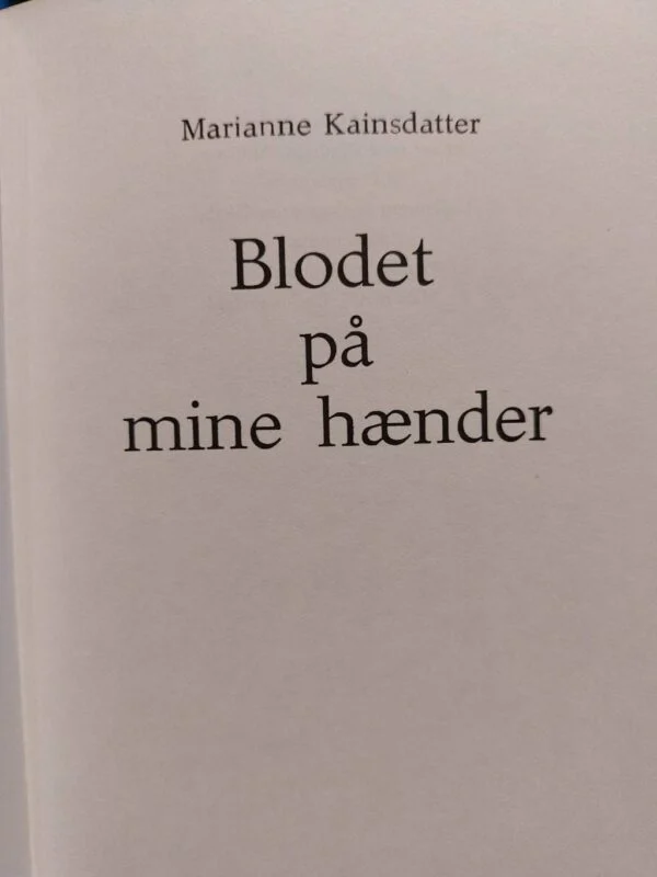 Titelblad af 'Blodet på mine hænder' af Marianne Kainsdatter