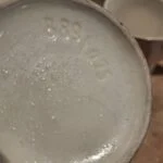 Bund af tekanden med stempel og let patina