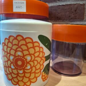 Farverig retro opbevaringskrukke fra Lønborg Denmark med orange blomstermønster