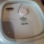 Bagside med Rosenthal Studio-Linie logo og ophæng
