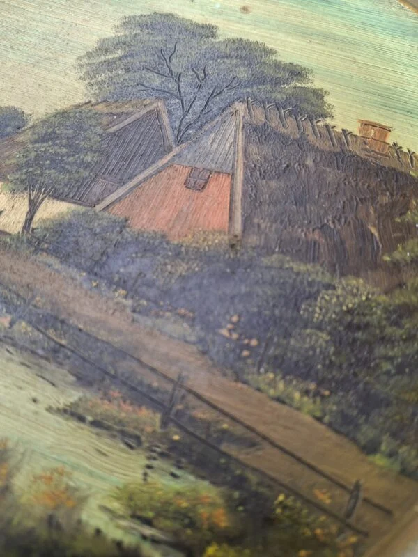 Detalje af stråtækte huse og den strukturerede farveoverflade i landskabsmotivet