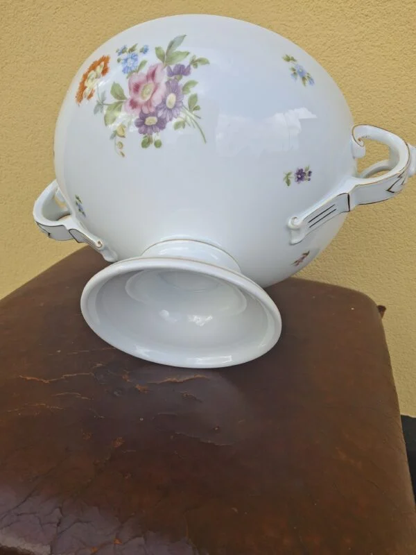 Rosenthal skål med blomster på ydersiden og rund fod med gulddetaljer